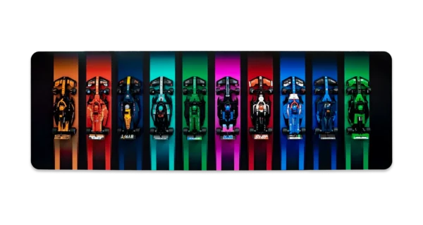 Ten LEGO Speed Champions F1 cars mounted on a dark BrickScapes custom horizontal wall display panel with colorful slots.