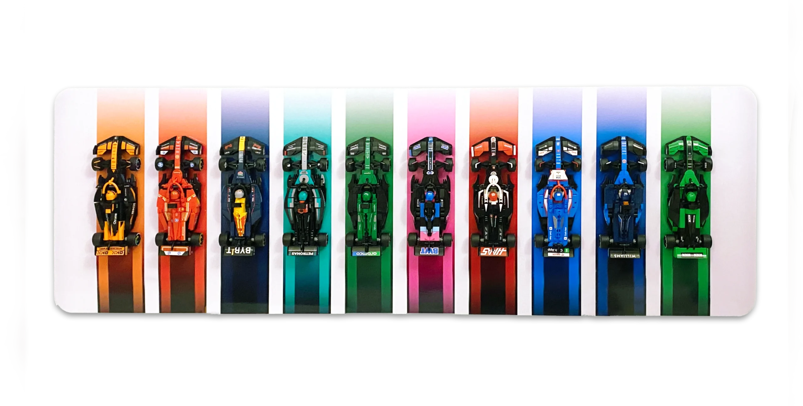 Ten LEGO Speed Champions F1 cars mounted on a white BrickScapes custom horizontal wall display panel.